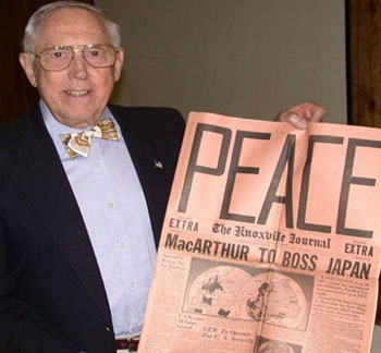 Bill Wilcox with an original copy of the Knoxville Journal announcing the end of the war