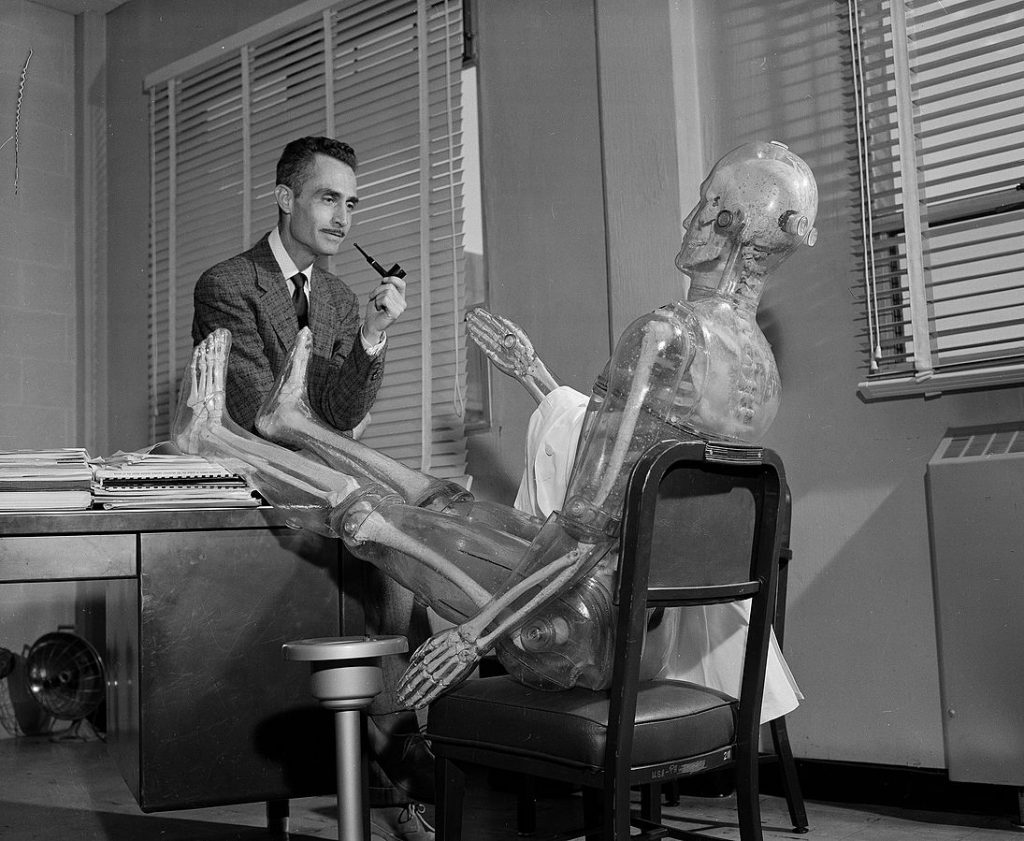 Wright Langham and a plastic skeleton used for plutonium research