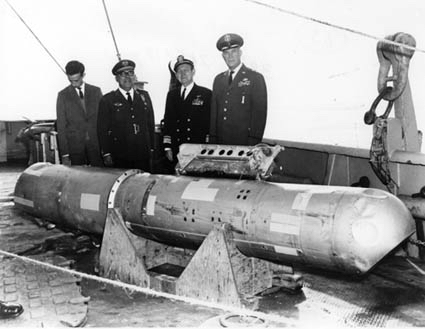 U.S. and Spanish officials with the recovered fourth bomb after the Palomares incident.