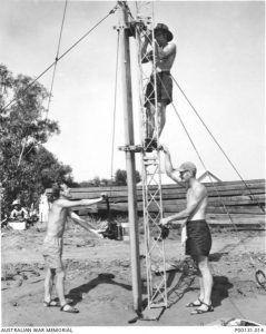 British workers prepare a radio antenna for Operation Hurricane