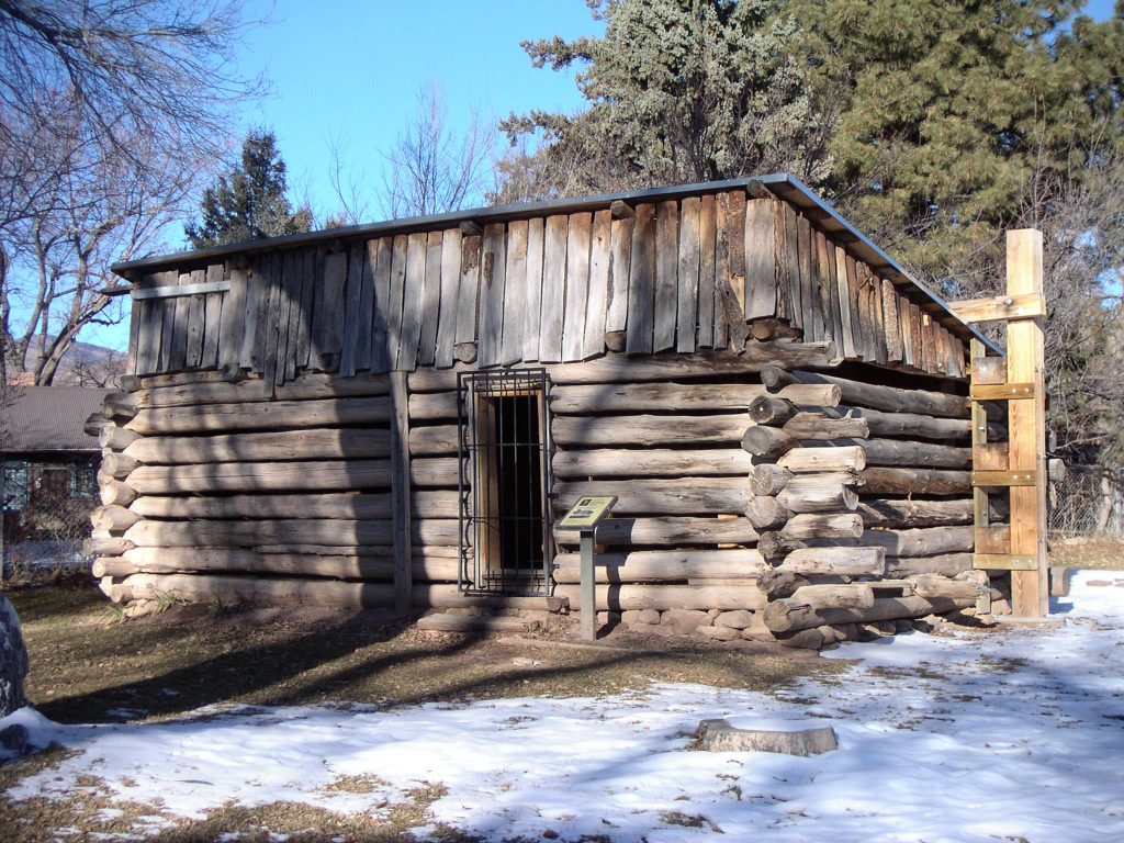 The Romero Cabin, built by Hispano homesteaders in 1913, was rebuilt for display in downtown Los Alamos