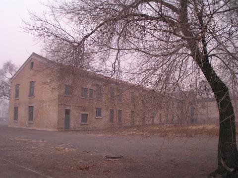 Building on the site of Unit 731. Image courtesy of Wikimedia Commons.