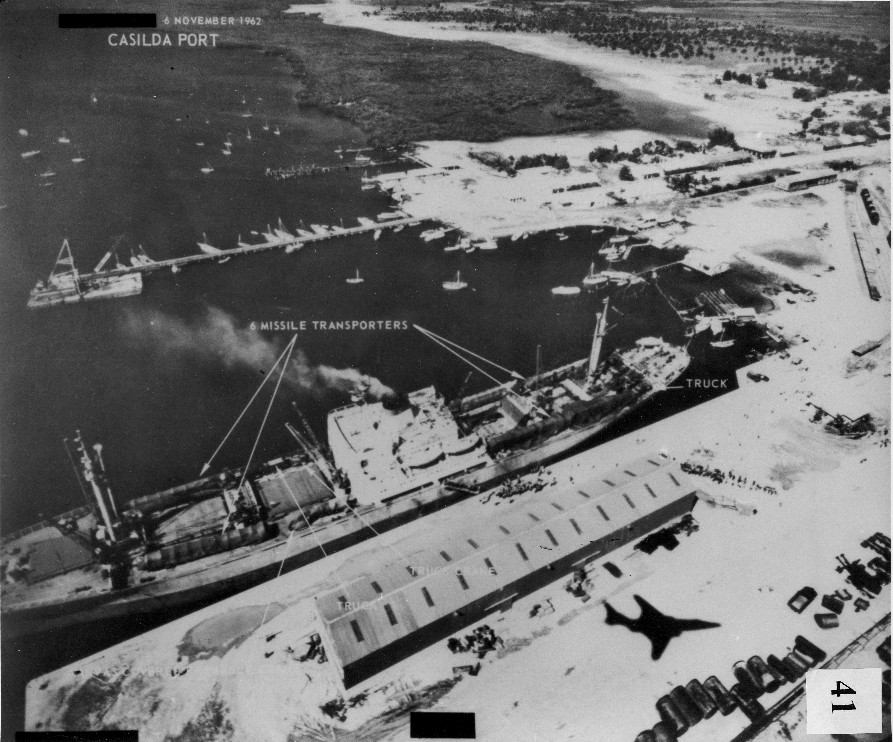 Six Soviet missile transporters are loaded onto a ship at the Port of Casilda in Cuba, November 6, 1962